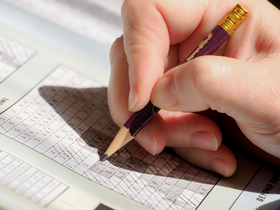 Close-up of insurance policy documents with a magnifying glass